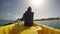 Woman Kayaking On Sea During Sunny Day