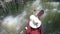 Woman kayaking on tropical river action camera pov back rear view of girl paddling on kayak boat