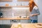 Woman keeping kitchen tidy and clean