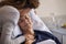 Woman kissing her mother at hospital