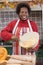 Woman in kitchen making Halloween treats