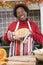 Woman in kitchen making Halloween treats