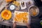 Woman in kitchen making prepares a pie with pumpkin