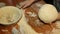 Woman knead the dough on the table