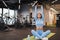 Woman kneading muscles before intense workout in the gym.