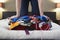 Woman Kneeling On Overstuffed Suitcase