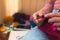 Woman is knitting, female hands close-up