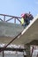 Woman labor in construction site.