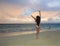 Woman on lanikai beach at sunrise