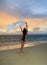 Woman on lanikai beach at sunrise