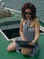 Woman with laptop on boat