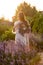 Woman with lavender wreath and whitre dress