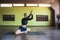 A woman leading a healthy lifestyle and practicing yoga, performs the exercise of Baddha konasana, a butterfly pose