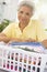 Woman Leaning On Washing Basket