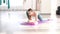 woman leans her palms on purple yoga blocks. Full HD