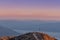 Woman Leaps at Sunset in Death Valley Mountains