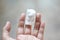Woman left hand with gauze to prevent infection on middle finger after cleaning wound from cat bite