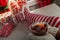 Woman legs with socks and slipper drinking tea, Christmas concept