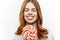 woman licking lollipop delight sweet candy light background