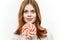 woman licking lollipop delight sweet candy light background