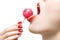 Woman licking sweet sugar candy closeup