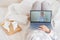 A woman lies on a bed and listens to advice on the treatment of a cold from a therapist. Girl watching a medical