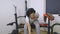 Woman lifting dumbbell and feels heartache