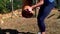 Woman lifting heavy wooden logs during obstacle course