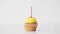 Woman with lighting candle on birthday cupcake