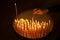 Woman lighting candles in a church