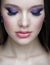 Woman with lilac beauty eyes makeup. Female with purple smoky eyes eye shadows