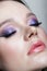 Woman with lilac beauty eyes makeup. Female with purple smoky eyes eye shadows