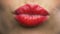 Woman lips with red lipstick making kiss