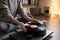 Woman listening to music, relaxing, enjoying life at home. Turntable playing vinyl LP record.