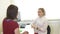 Woman listens to a doctor\'s recommendation. Doctor and patient talk. Young female medical doctor talking to a patient at hospital.