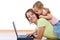 Woman and little girl with laptop