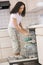 Woman Loading Dishwasher