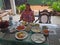 Woman and local cuisine and dishes of Sri Lanka