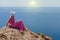 Woman in a long summer dress in Greece, Santorini.