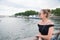 Woman look at seine river in paris, france. Sensual woman in sunglasses on bridge on summer day. Vacation and wanderlust concept