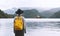 Woman looking at beautiful Lake Bled. Tourist travel in Slovenia, Europe