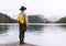 Woman looking at beautiful Lake Bled. Tourist travel in Slovenia, Europe