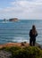 A woman looking at the cliffs in the Bay of Islands area at the Great Ocean Road in Australia