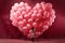 Woman looking on giant pink heart made of balloons on pink background. Helium pink balloons, Valentines day concept, celebrating