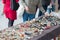 Woman looking at jewellery, bracelets and accessories on market