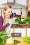 Woman looking magnifier at vegetables