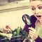 Woman looking magnifier at vegetables