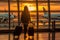 woman looking at plane , standing near the airport window, holding luggage. AI Generated