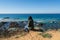 Woman looking at Praia da Samoqueira