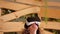 Woman looking through VR headset and jum